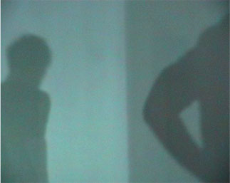 image of shadow of dancer standing at rest